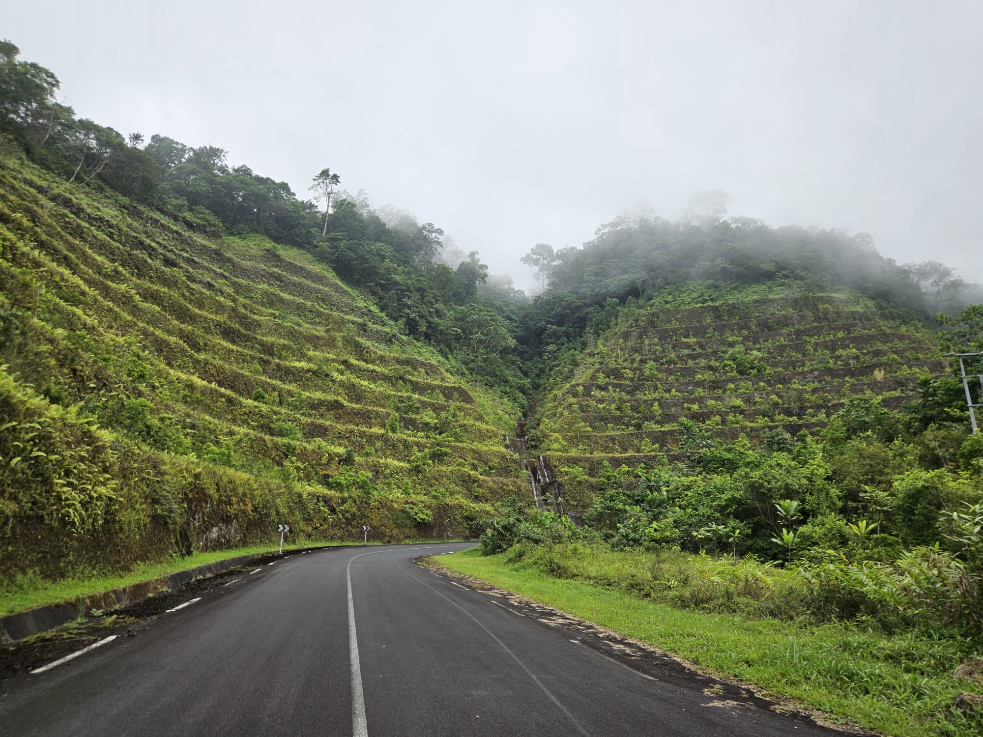Road winding through green hills in Equatorial Guinea