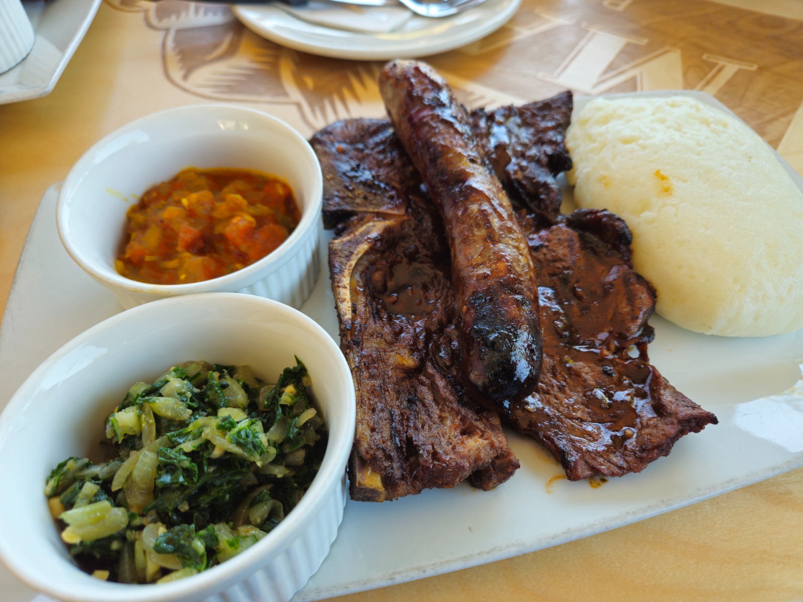 Pap with meat and vegetables in Lesotho