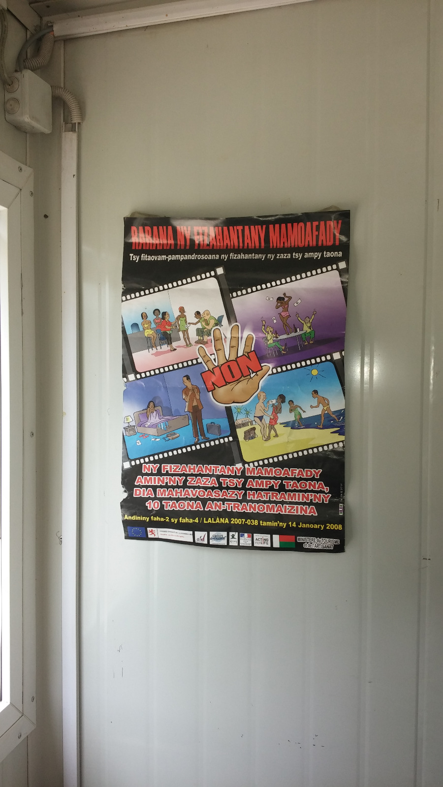 Child protection poster in Toamasina, Madagascar