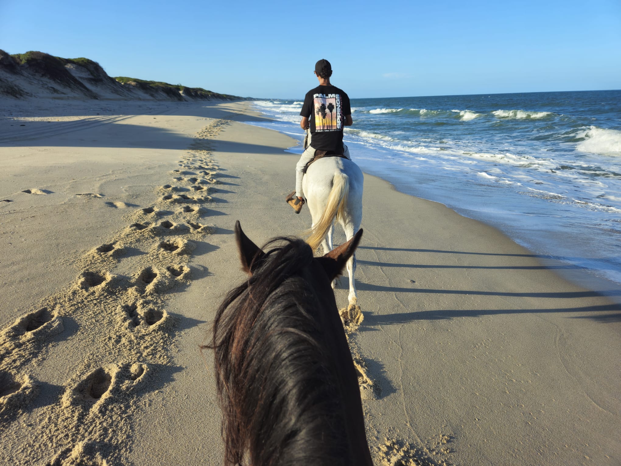 Horse riding on the beach in Macaneta
