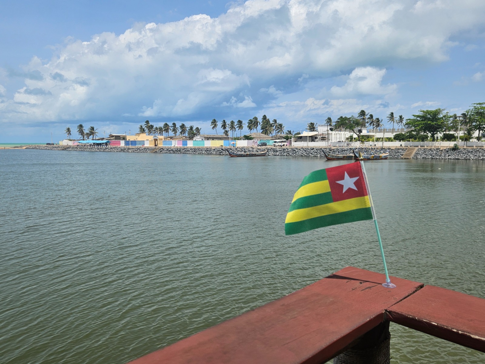 Togo flag by the waterfront in Aného
