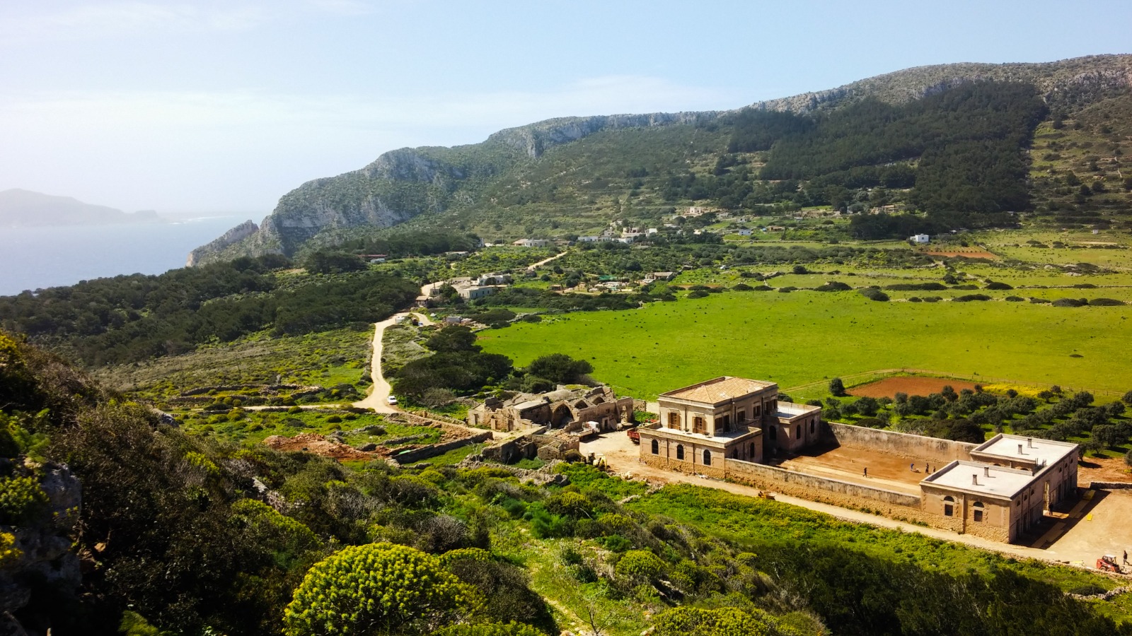 Case Florio and the green landscape of Levanzo in Sicily